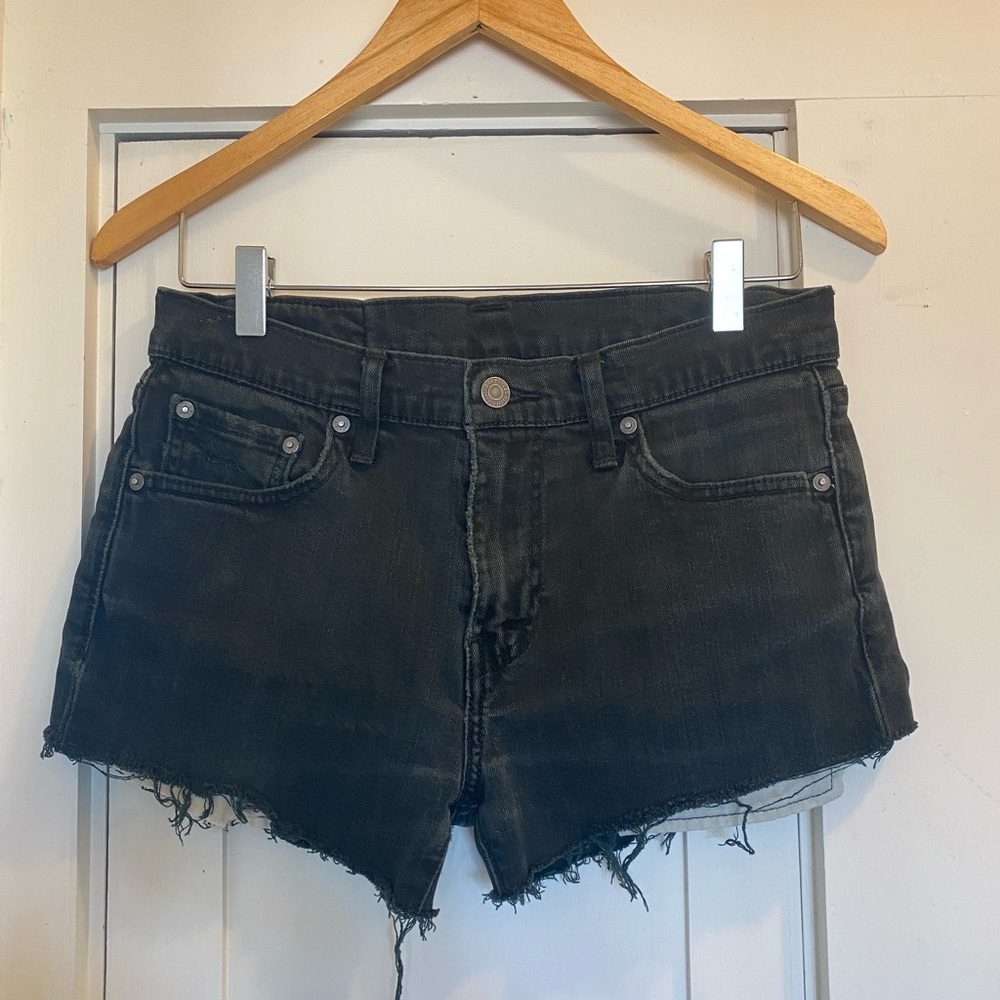 Vintage Levi’s 511 Black distressed jean shorts